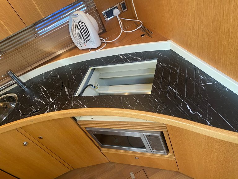 Premier yacht wraps kitchen black marble 2